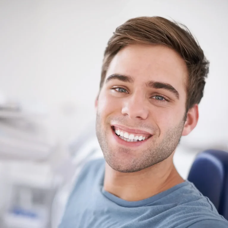 every-dentists-favorite-patient-portrait-young-smiling-man-sitting-dentists-chair